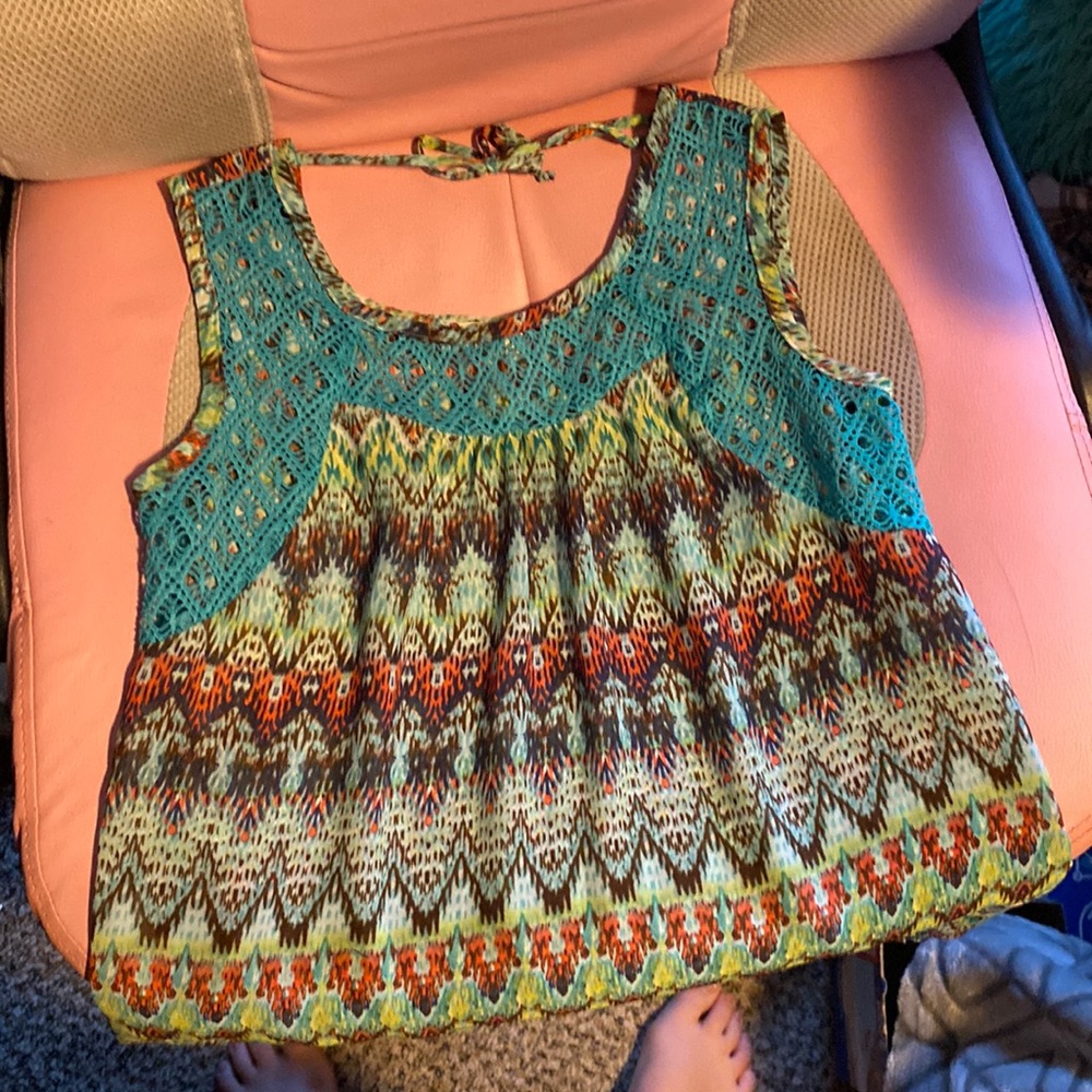 This is a sheer tank top with a fun design